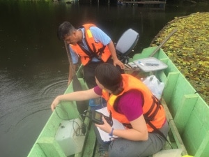 Edris and Jenna collecting water quality data in Tungong Lake